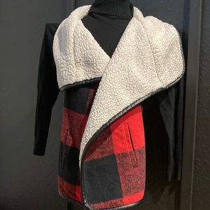 Red and black Sherpa lined vest. Size medium